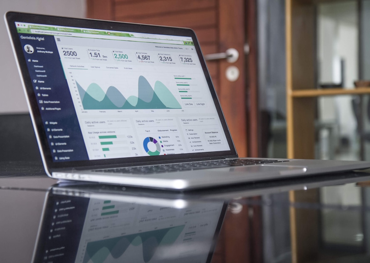 Abstract analytics monitors showing campaign performance metrics